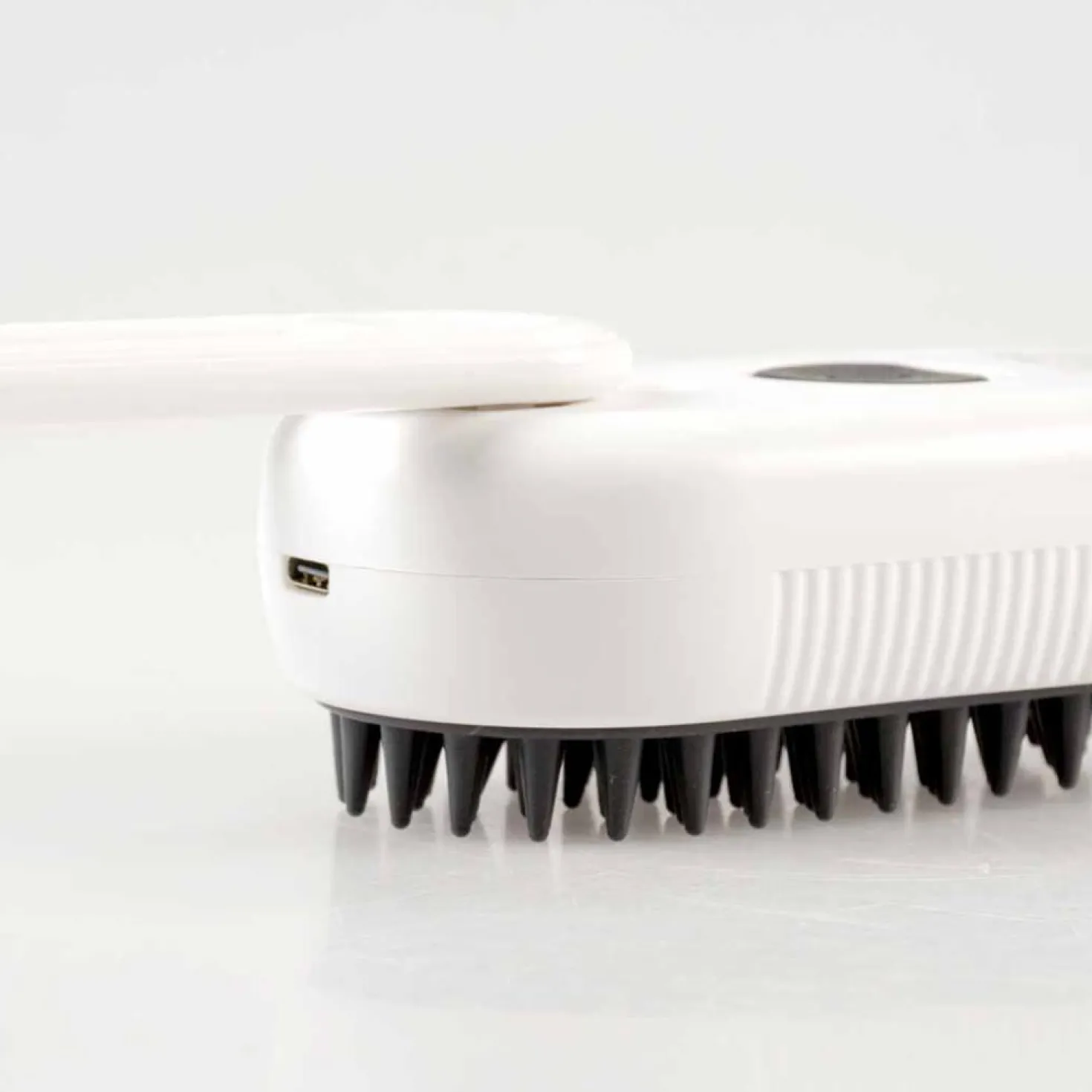 Brosse à vapeur et massage